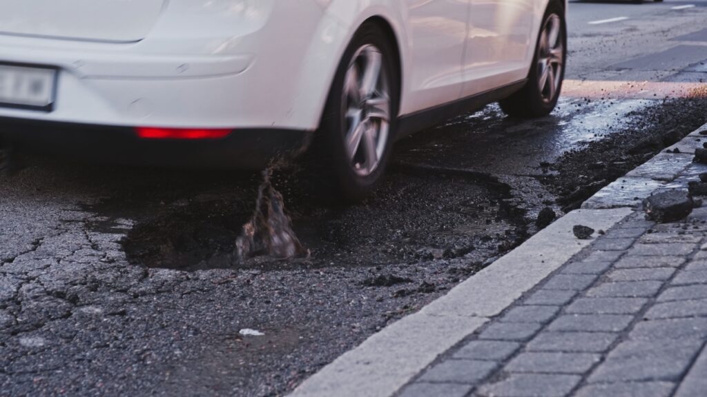 Effective Strategies to Shield Your Car from Pothole Damage - DriveAutoZone: Car News, Reviews & Auto Tech Updates Effective Strategies to Shield Your Car from Pothole Damage